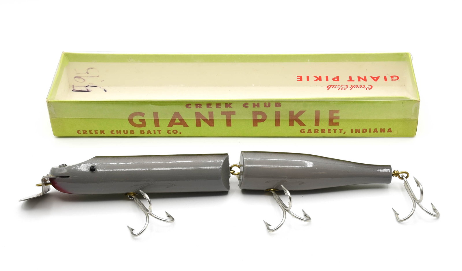 Creek Chub 810 Giant Jointed Pikie Special: Finished in extremely rare number "10", gray with black back, black tack eyes and red chin blush. This Special Order bait is unfished, with only signs of age and movement within the box, near Ex due t