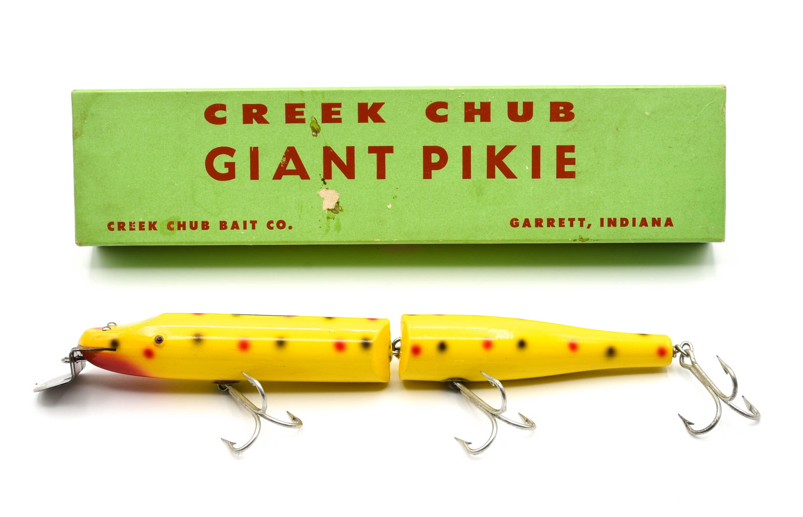 Creek Chub Giant Jointed Pikie Special: Unfished and finished in uncataloged yellow spotted, with tack eyes and near perfect back decal. Bright and shiny throughout, the only flaws keeping this striking bait from grading solid Ex are faint 