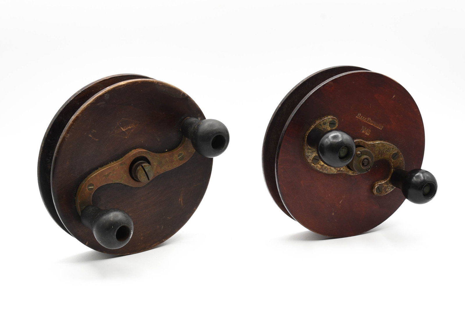 2 Nottingham Trolling Reels: 6" diameter and 6 1/4" diameters, the smaller marked Maximus Ball Bearing, the larger marked Ball Bearing No. 46. Both in VG/VG+ condition with moderate wear and varnish loss.