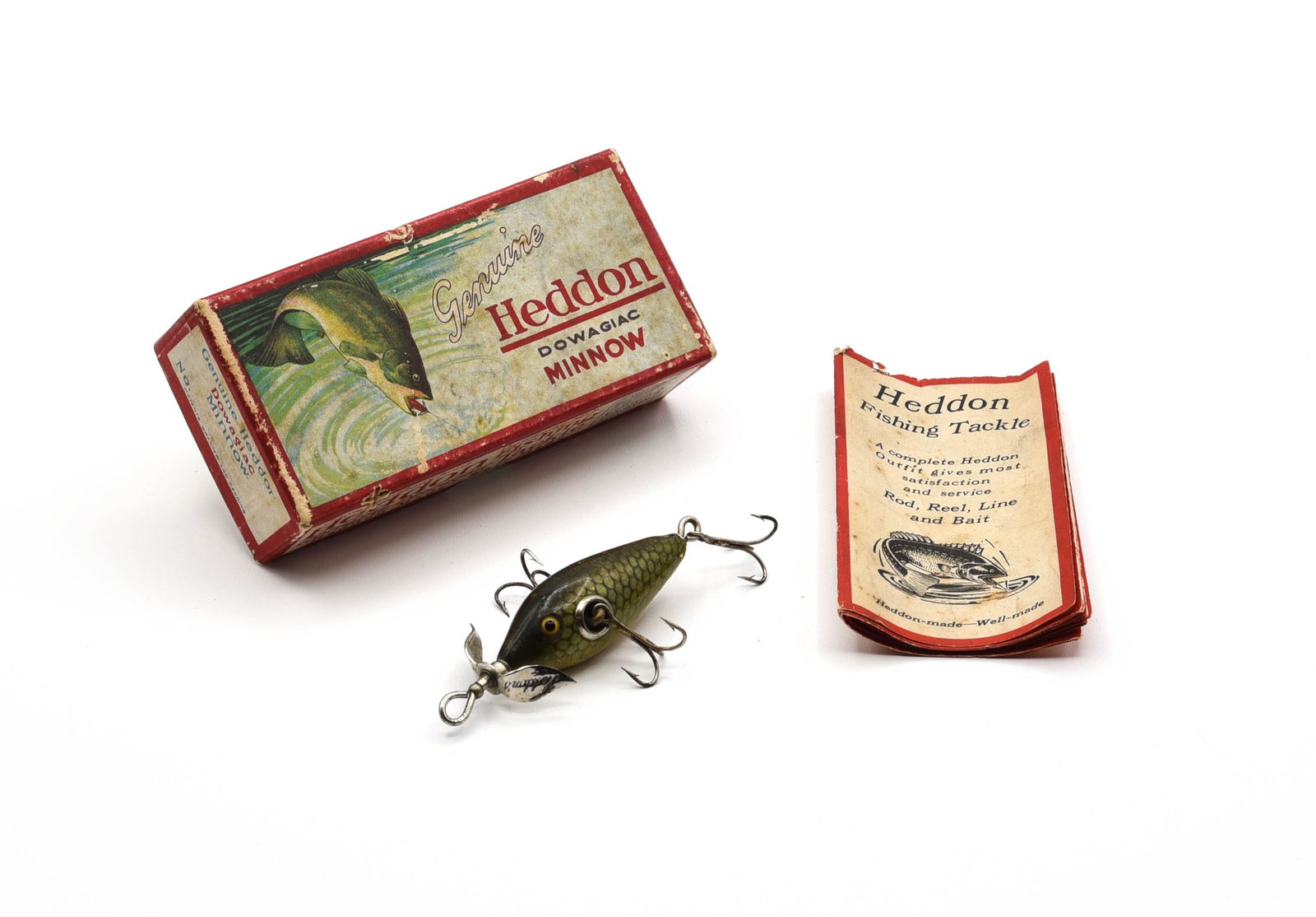 Heddon 29D Midget Minnow: Finished in green scale, a very hard finish to find on the #20 underwater minnow. With cup hardware, marked front prop and good glass eyes, about VG+ condition due to general wear/rubs, a few pointers