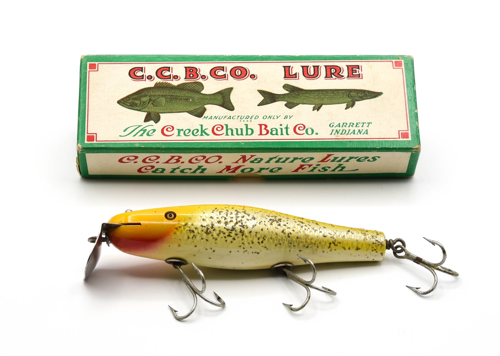Creek Chub 7337 Husky Surfster: Scarce 6" mid-size Surfster in bright yellow flash finish, with gold back stamp and good glass eyes. Condition on this short production bait is near Ex, bright and shiny, with a few small pointers, sl