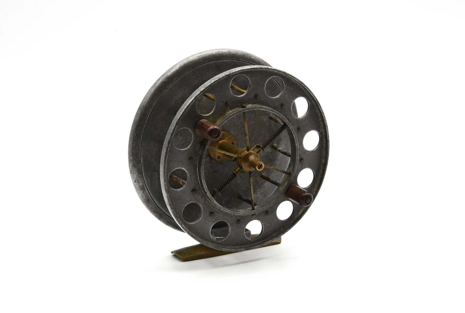 Allcock Aerial Match Reel: 4 5/8" diameter, 1 1/4" wide spool, two ebonite grasps, sliding click switch on the tail plate and a full length smooth brass foot. Condition is VG+/Ex- due mostly to finish wear.