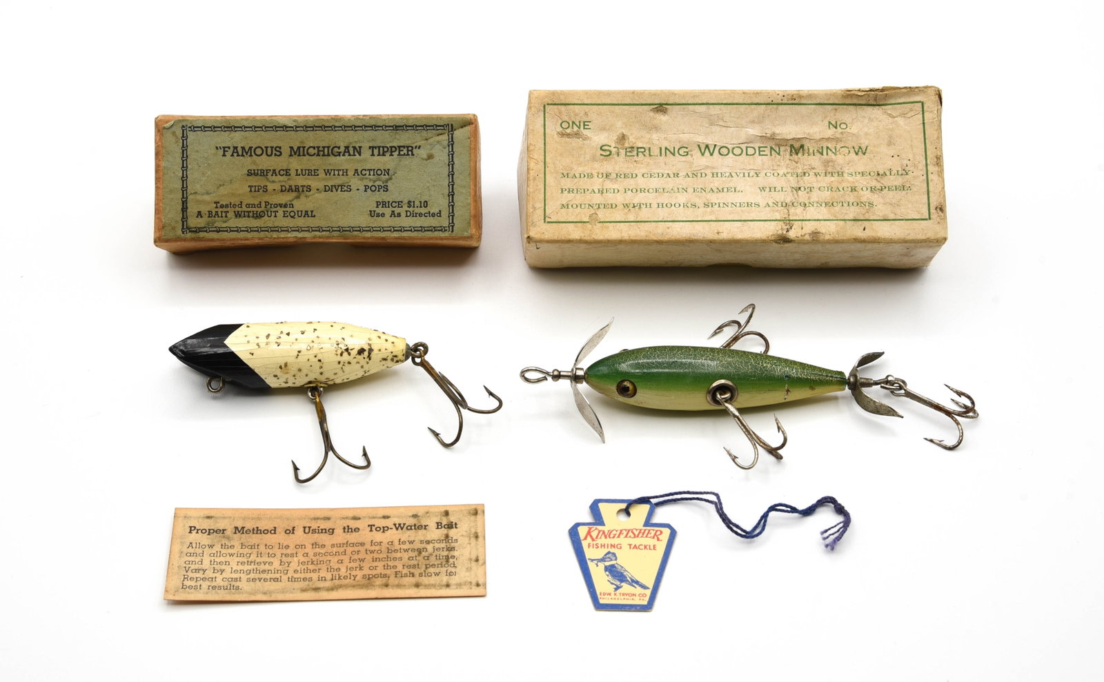 Sterling Wooden Minnow & Michigan Tipper: Includes a 2pc Sterling Wooden Minnow box, unmarked for lure color/model (VG/VG+) with a section of the original tissue wrapping and coming with a green crackleback Kingfisher minnow (VG+/Ex-) retaini