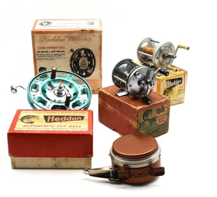 4 Boxed Heddon Reels