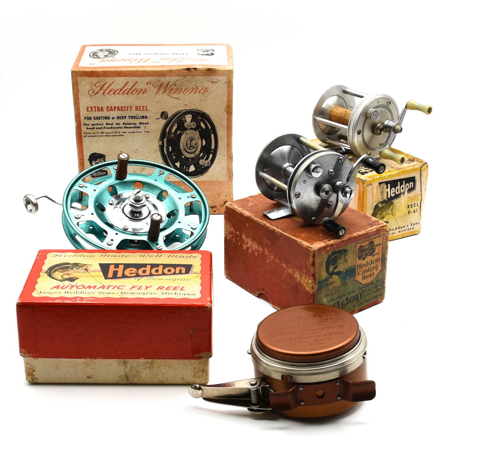 4 Boxed Heddon Reels (1 of 1)