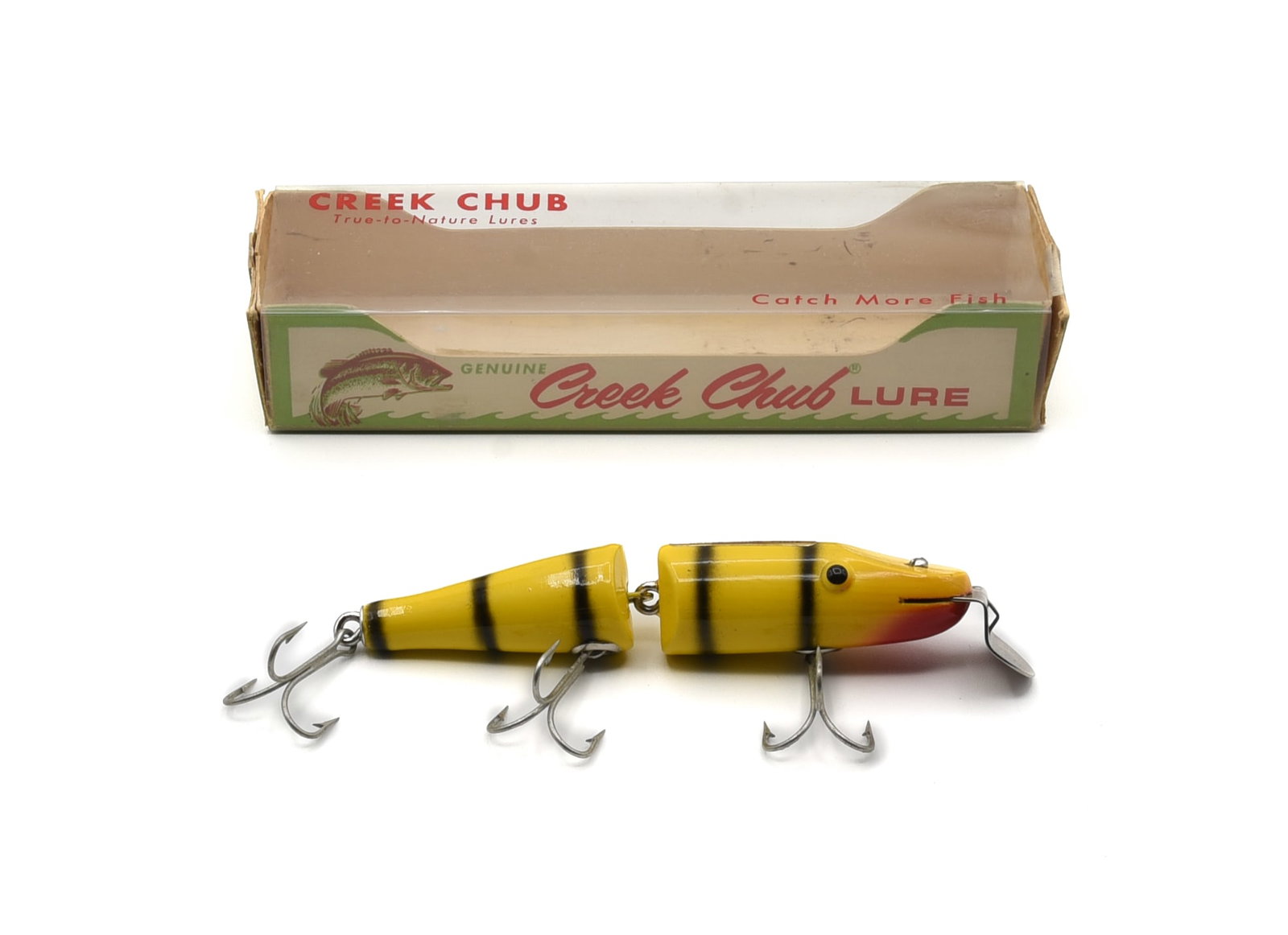 Creek Chub 2639 Jointed Pikie Special: Unfished Jointed Pikie in bright uncataloged tiger stripe, with scarce solid black tack eyes and gold foil decal. The condition is extraordinary, shiny Ex/Ex+ with no sign of use, most likely never ta