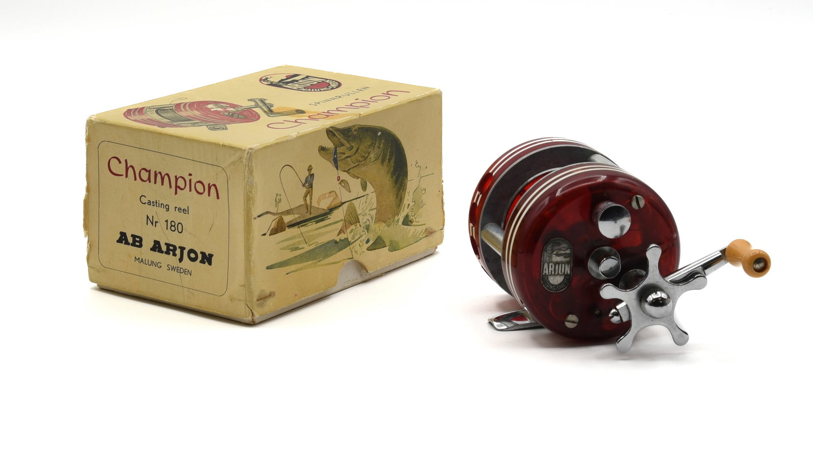 Arjon Champion Casting Reel: A mid-1950s Swedish reel with four port tail plate that houses the "fan blades" that controlled backlashes, a small star drag mounted outside the crank handle and narrow 1" wide spool. Unfished Ex con