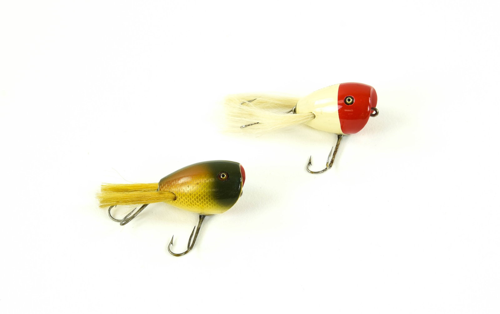 Creek Chub Surface Dingbats: Both with good glass eyes and original hair legs, including a military stenciled 5402 (red/white), Ex condition with only very slight wear/soiling, bright and shiny. And a Surface Dingbat in golden