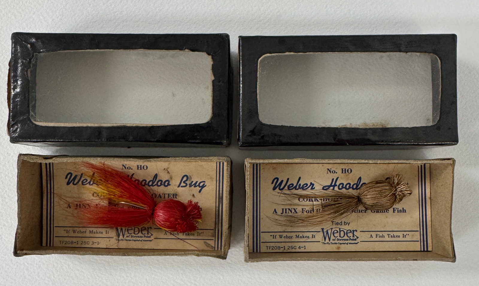 Weber Flyrod Hoodoo Bugs: Each coming on its original seldom-seen card, in a black window box with end label (Colors include red (Ex) and natural (VG+), the cards both marked No. HO Cork Body Floater. The boxes (marked HO9 and
