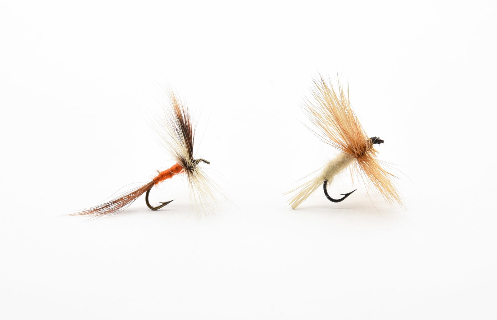 Lee Wulff Flies: Both hairwing pattern flies, tied without the aid of a vise, by the innovative American fly fishing icon, Lee Wulff (1905-1991). Both are in excellent condition, appearing unfished, returning to Lang'