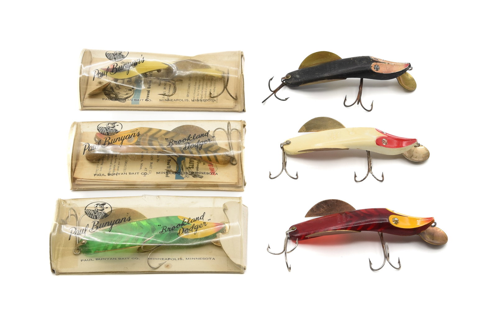 6 Bunyan Transparent Dodgers: Measuring just over 4" in length including the metal lip, all with rhinestone eyes and all but one marked with raised letters on the back. Transparent and opaque colors, three in the rounded "window"