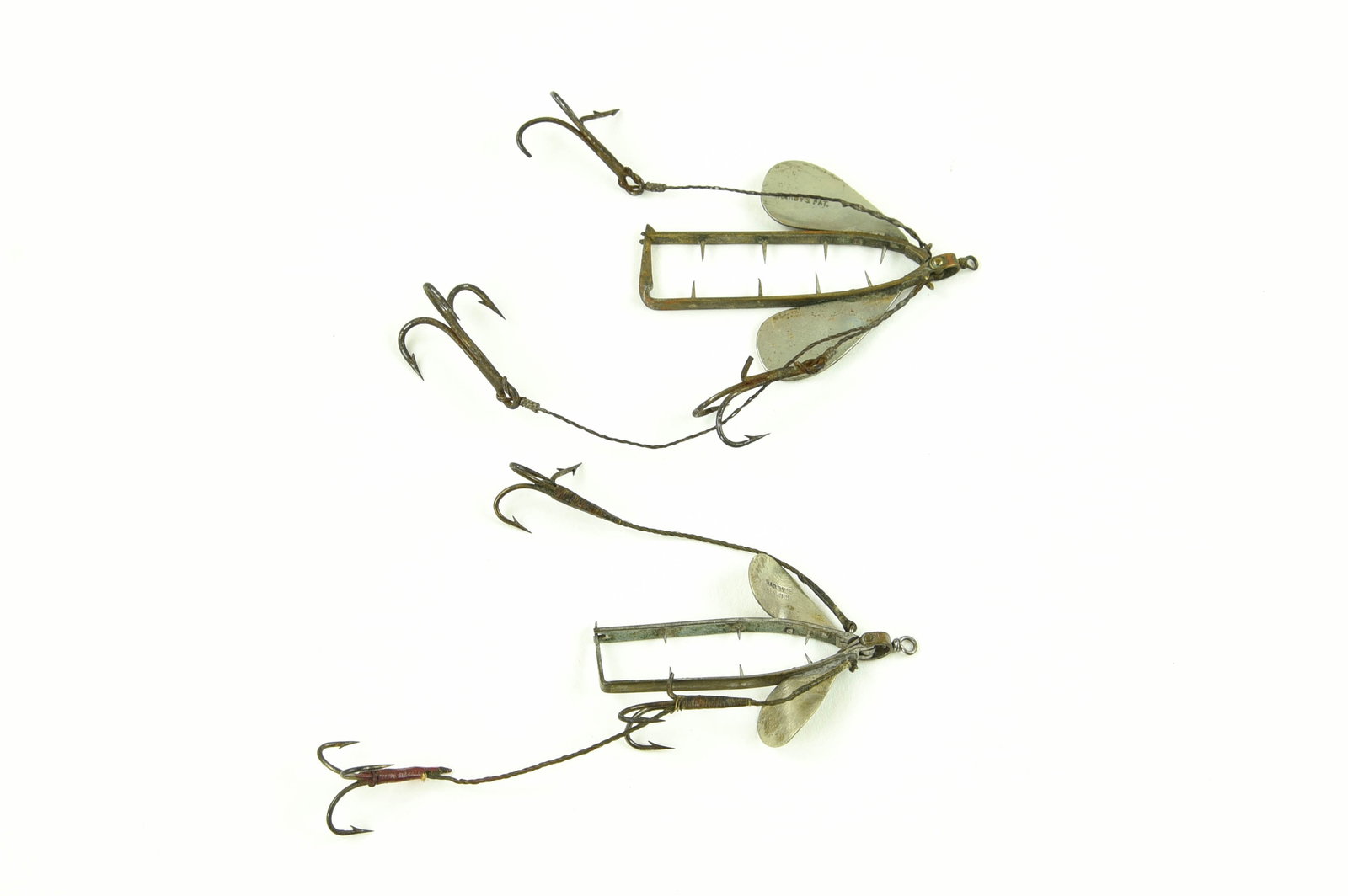 Early Hardy's Bait Harnesses: Measuring 2 1/4" and 2 3/4" not including the line tie or trailing hooks, both marked Hardy's Alnwick and Hardy's Pat. Each with a missing barb otherwise the condition is VG+/Ex-.
