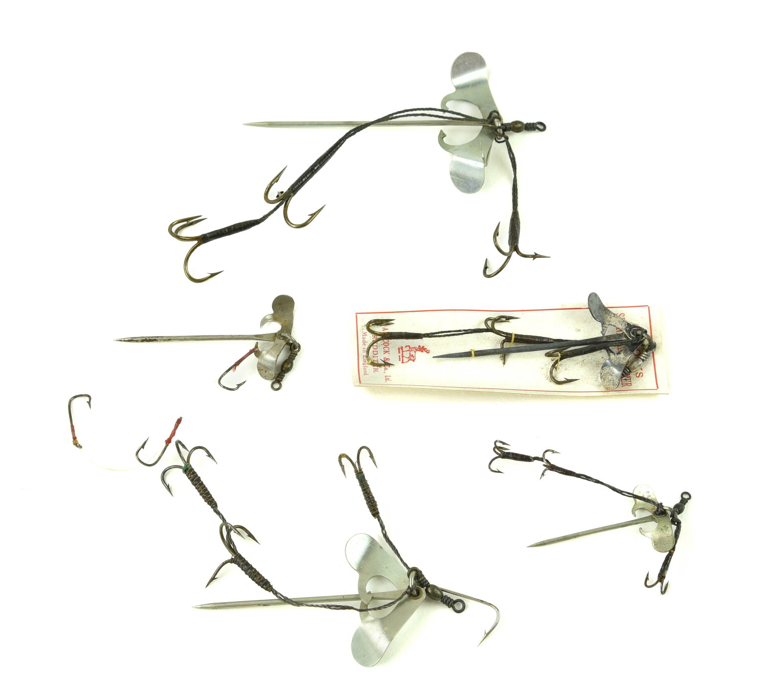 5 Early English Bait Harnesses: All but one is stamped Patent Archer, including two also stamped Milward's, with one still sewn on its original card. From 2 1/4" to 3 1/2" in length, Ex- to Ex, the S. Allcock's & Co. card in near