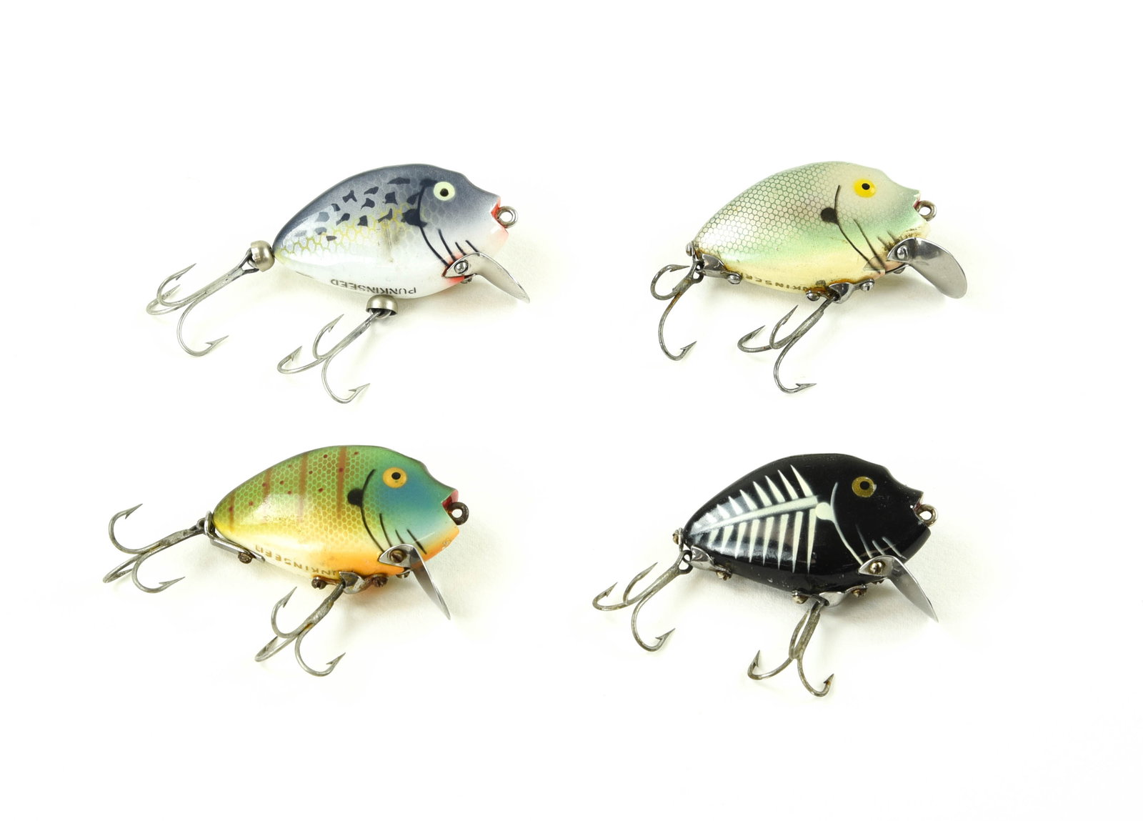 4 Heddon 9630 Punkinseed Spooks: Surface and bell hardware, all belly stenciled, colors include: black shore (VG/VG+), shad (near Ex-), sunfish (Ex-) and crappie (Ex-/Ex).