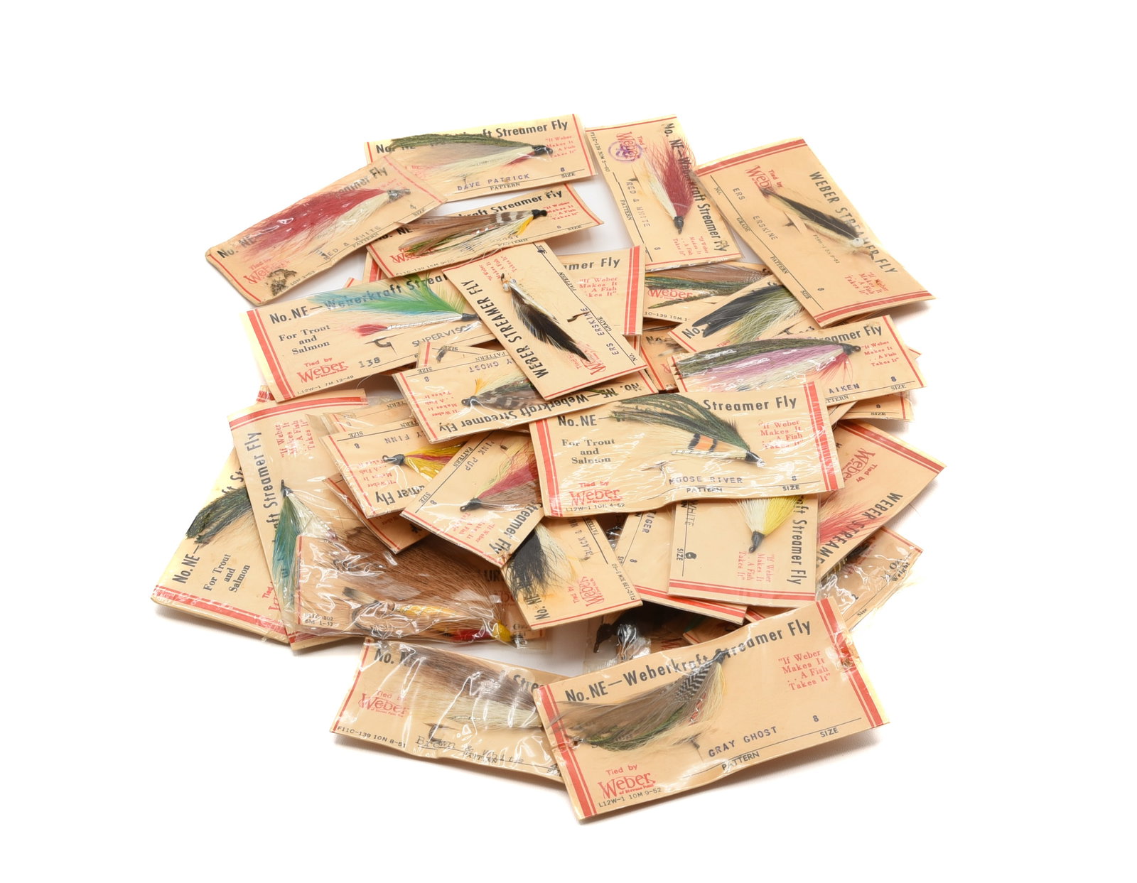 Weber Carded Flies: Includes (21) size 8 streamers on the original No. NE-Weberkraft Streamer Fly card, all but one is still sealed in cellophane, (8) size streamers on larger original cards (in cellophane), (2) Parma Be