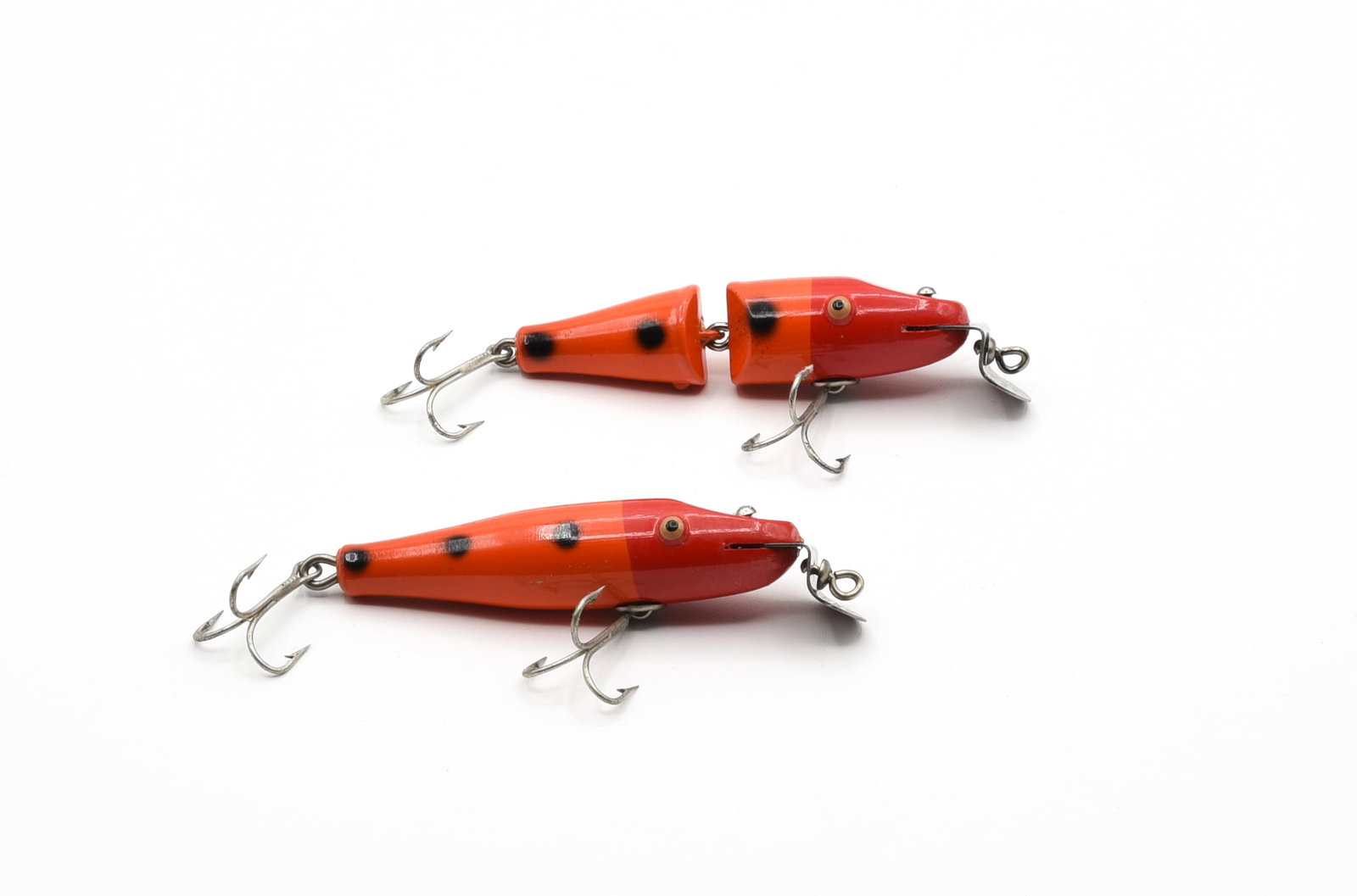 Creek Chub 930 & 2730 Pikies: Both finished in orange with black spots, a bold color on the smaller Pikie. Each with tack eyes and gold back stamp including a Special Order 900 (#30 was an uncataloged color on the Baby Pikie), shi