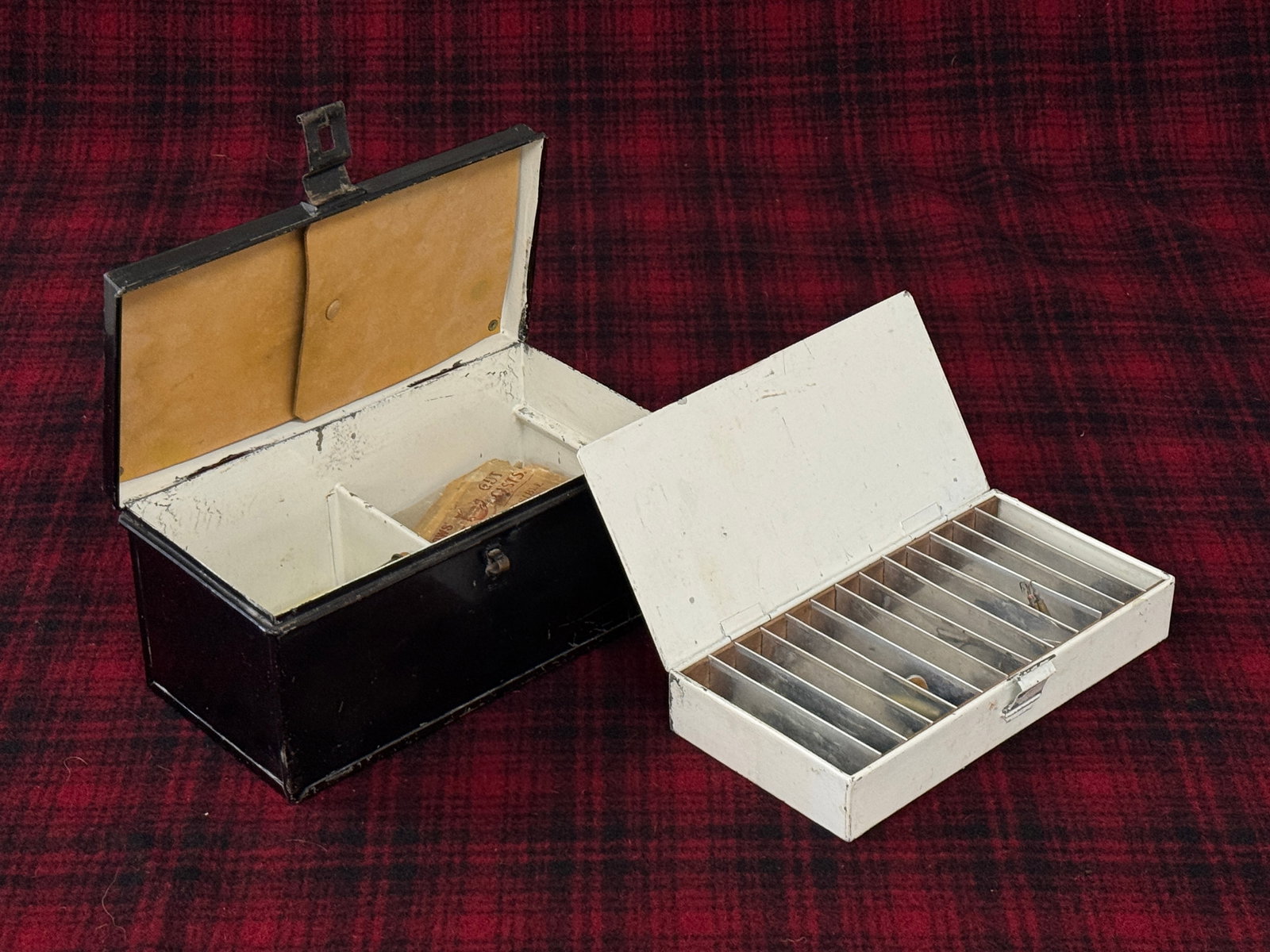 Early English Tackle Box: Rarely seen early box, measuring 10" x 5 1/2", black japanned exterior and white painted interior, retaining its snug fitting lift out compartmented tray and affixed leather leaves for storage on the