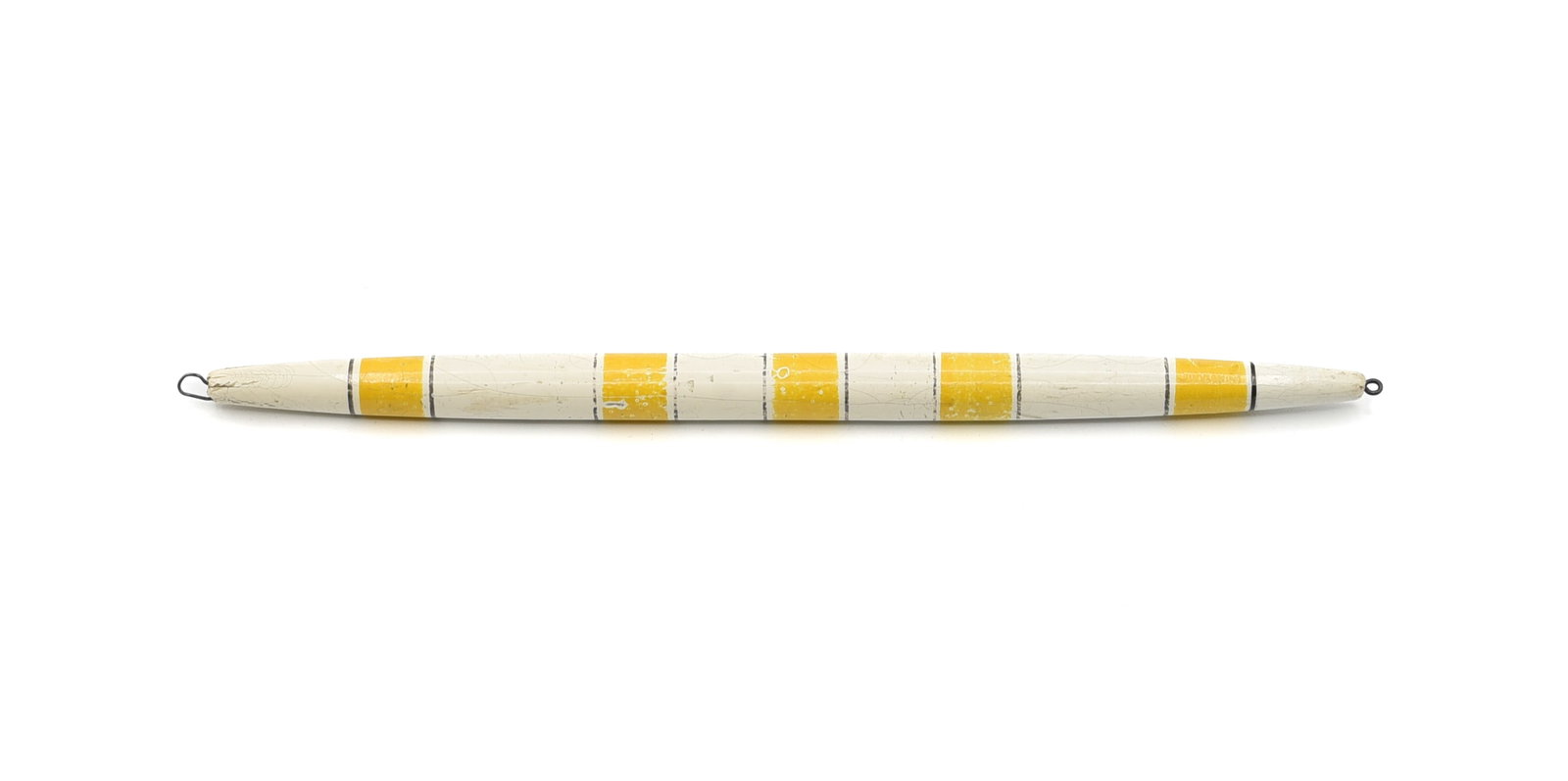 Creek Chub Float: 8 1/4" in length and finished in yellow and white with thin black stripes, grading VG/VG+ with general use wear/rubs, small dings, one replaced line tie and age lines. A short production item, all Cre