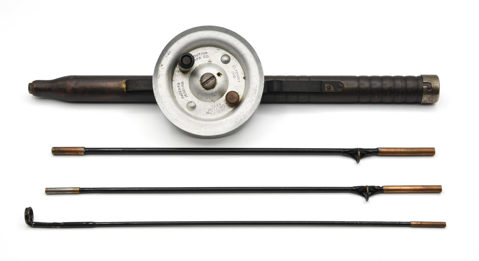 Outing Mfg. Co. "Dewey's Getum Reel": Introduced in 1925, this all-in-one outfit features a four section metal rod with original guides measuring four feet when assembled, with three sections stored in the handle when not in use. The alum