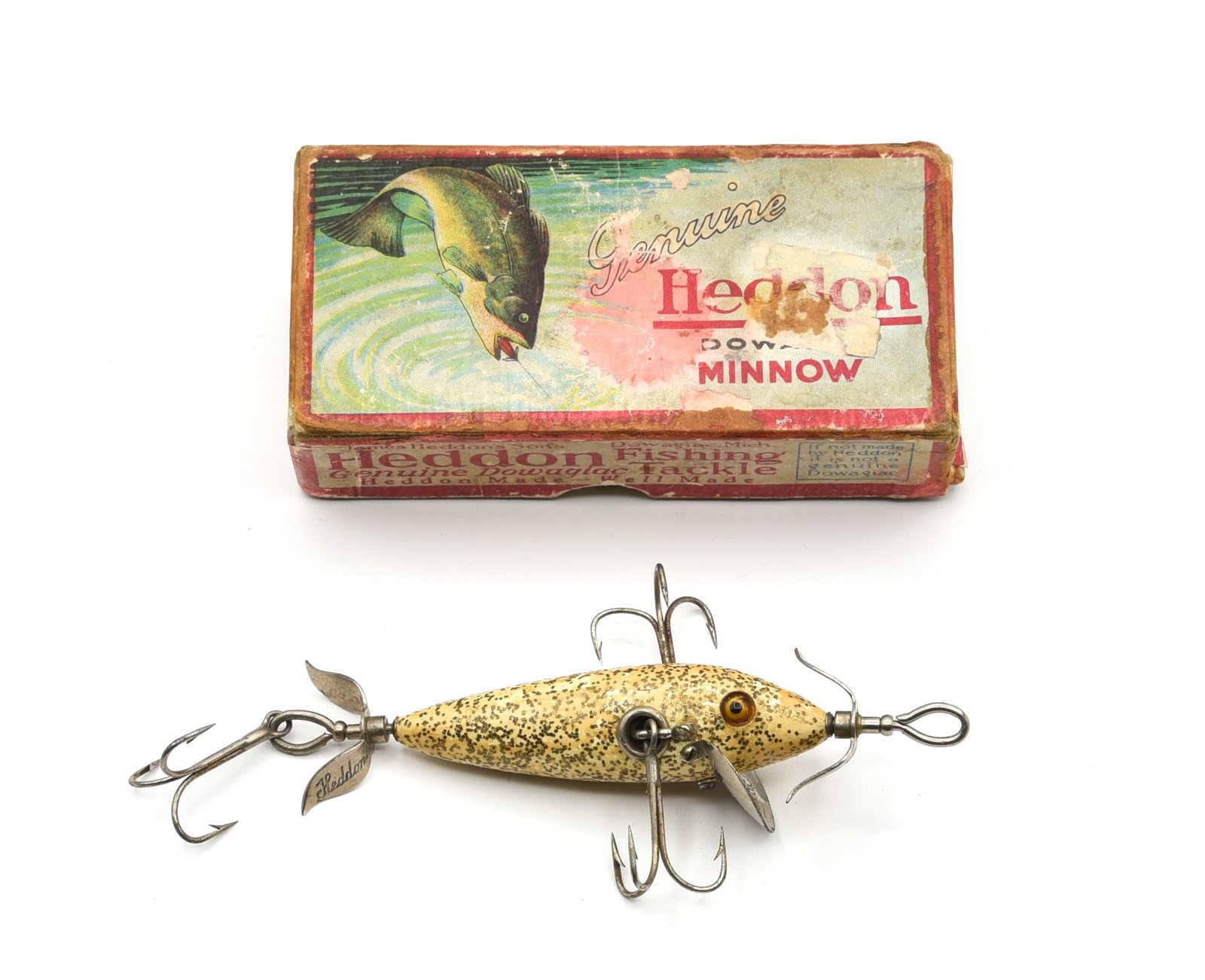 Heddon Experimental 3hk Minnow: Appearing to be factory rigged with a marked diving lip, an uncataloged feature on the 100 minnow. Finished in white body with flitter, L-rig, marked props and good glass eyes. If not for common varni