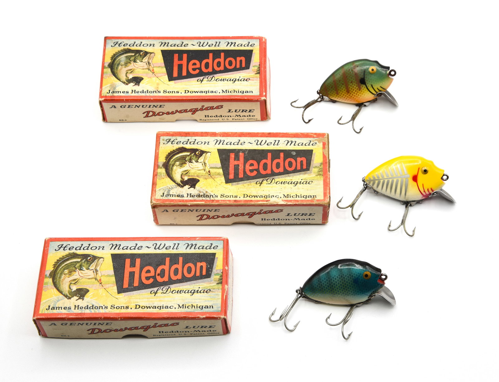 3 Heddon 9630 Punkinseeds: Each coming in the correct stamped banner box including yellow shore (Ex), sunfish (Ex-/Ex) and bluegill (unfished Ex-/Ex). Boxes grade near Ex, VG/VG+ and Ex- respectively.