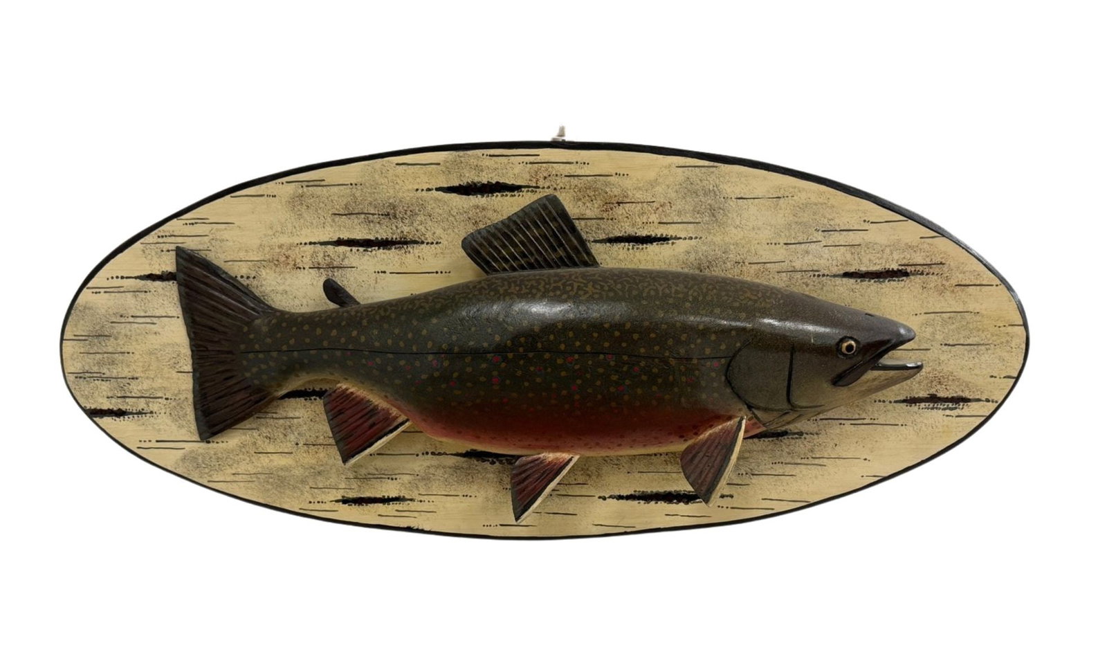 Lawrence C. Irving Trout Carving on Painted Plaque: Lawrence C. Irving (1919-1998) Winthrop, Maine. Fish is 21 inches long, carved out of wood and in excellent condition. Wooden oval plaque is 29" x 12".