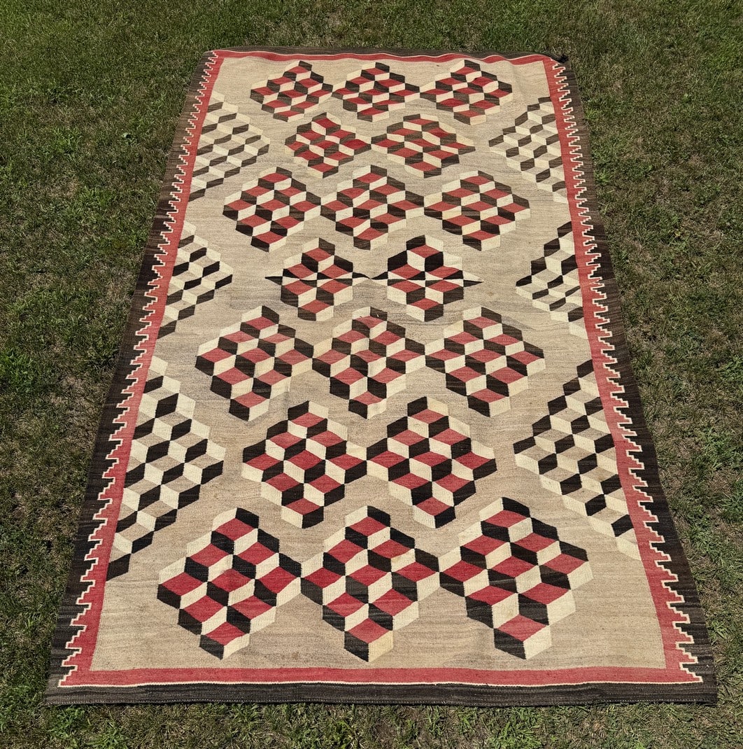 Navajo Rug - Room Size: tightly woven. From the A-Frame at Deerlands in Whitney Park. Rug has wear and one side is faded much more than the other. 74" x 134"