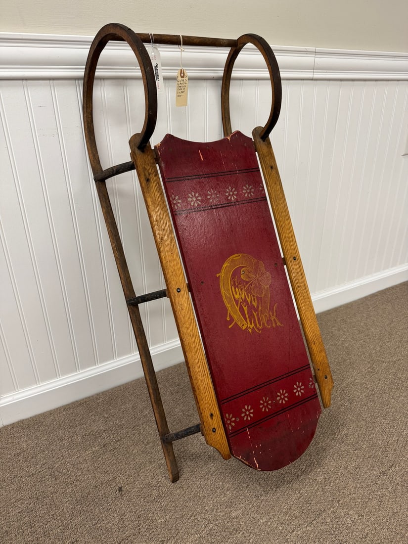 Paris Mfg Co. "Good Luck" Sled Circa 1900: with horse shoes, signed and numbered 65. Original paint. 36" x 14.5" wide x 10.5"