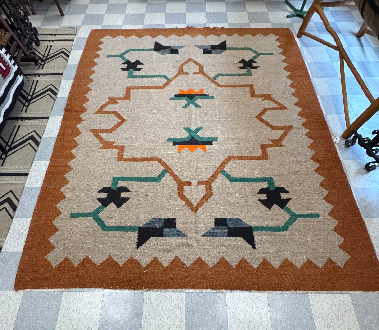 Arts & Crafts Drugget Rug: with geometric designs. Orange border, some roughness around edge. 9' x 12'. From Camp Togus at Whitney Park.