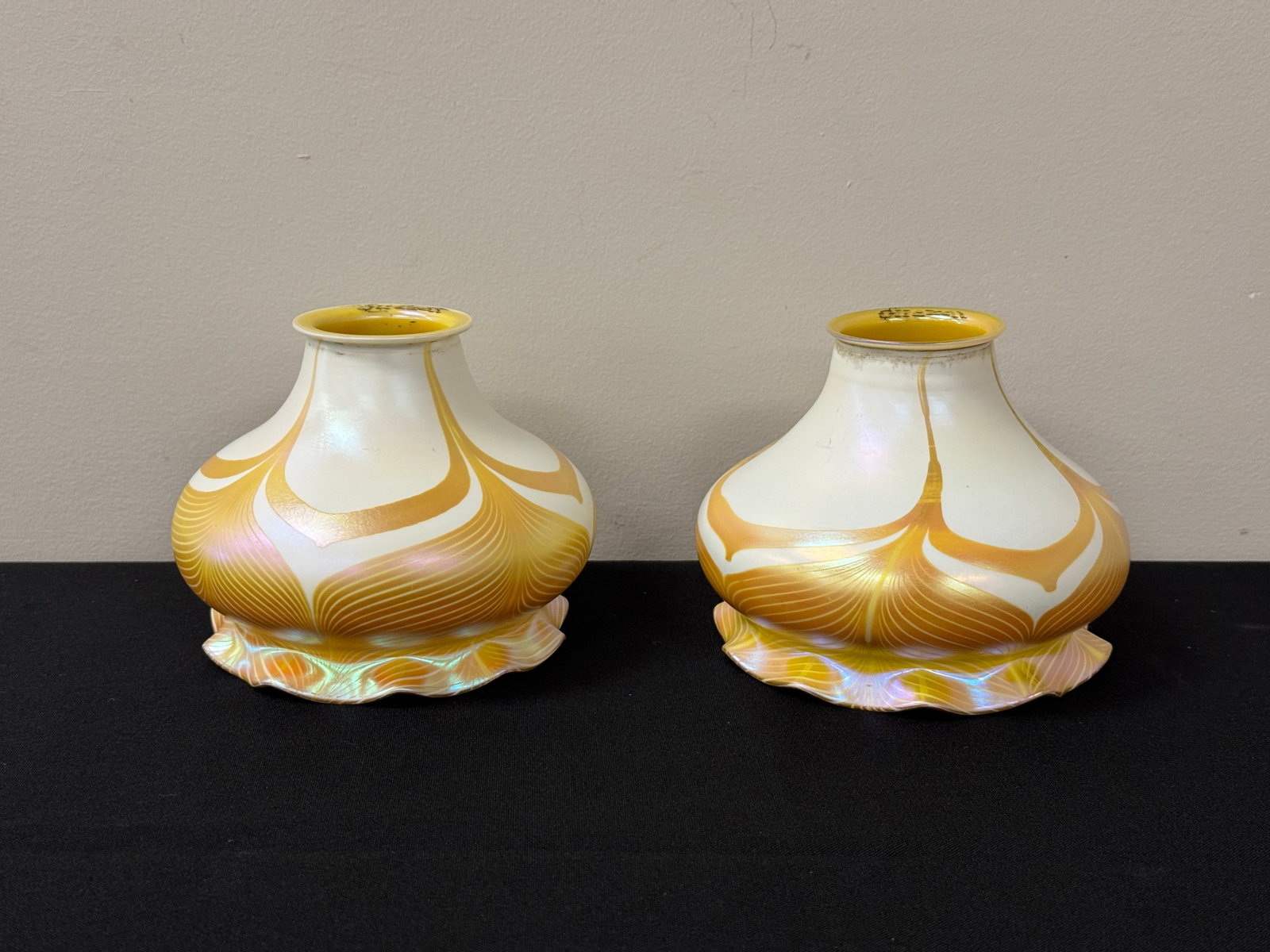 Pair of Quezal Art Glass Pulled Feather Shades: 5.5" diameter shade that fits a 2" fitter.