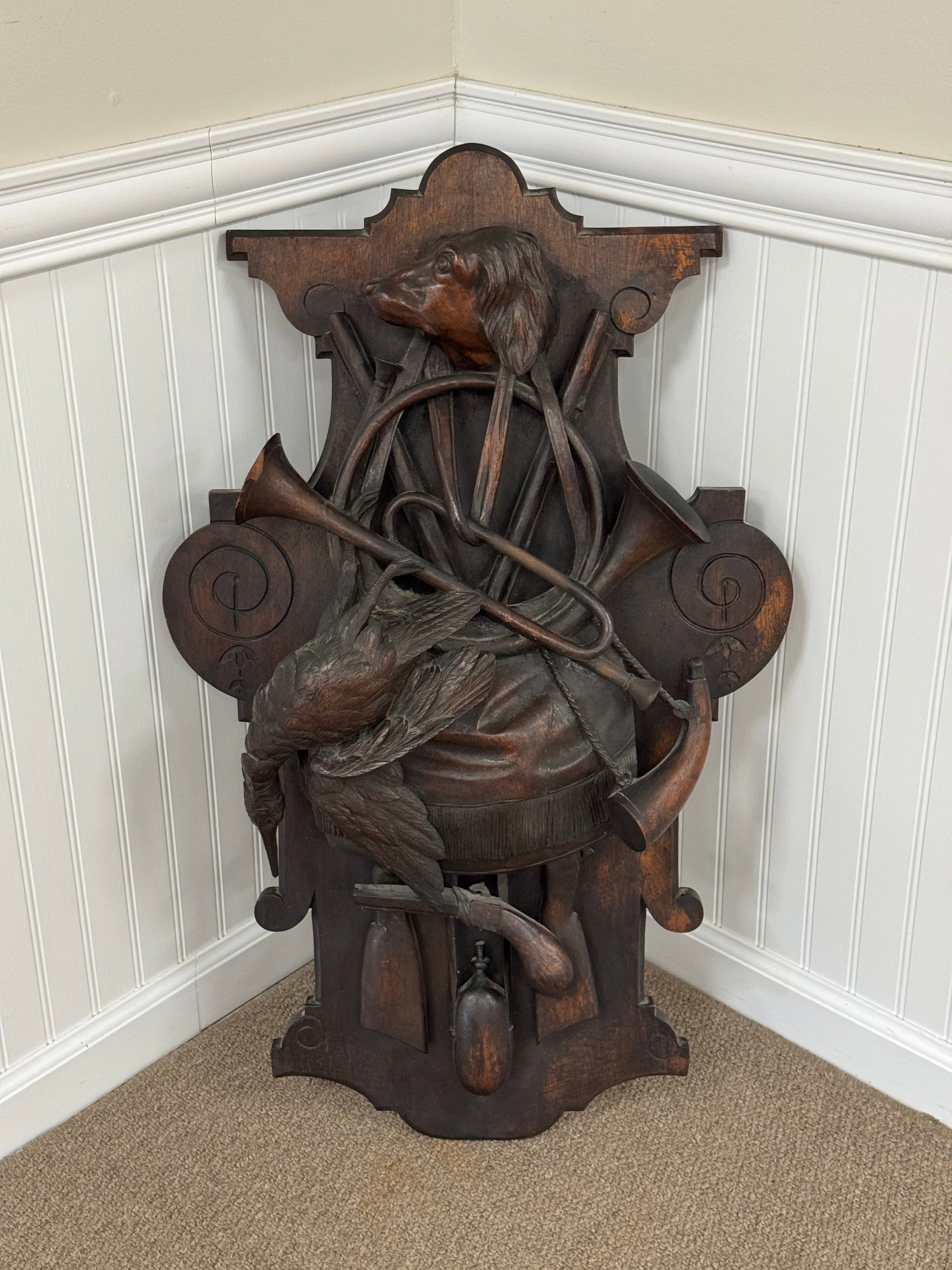 Black Forest Wall Plaque with Dog Head: and hanging game. From a mountain home in North Carolina. 34.5" tall x 22" wide.