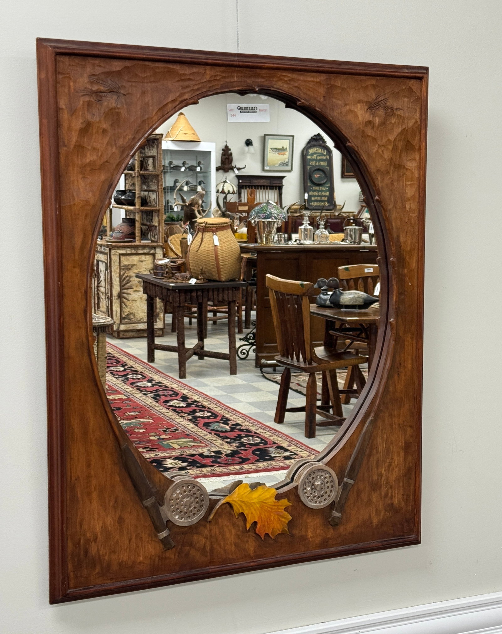 Fly Fishing Wooden Carved Oval Mirror: Carved fly rods and reels. From Camp Deerlands, Whitney Park. 24" x 30"