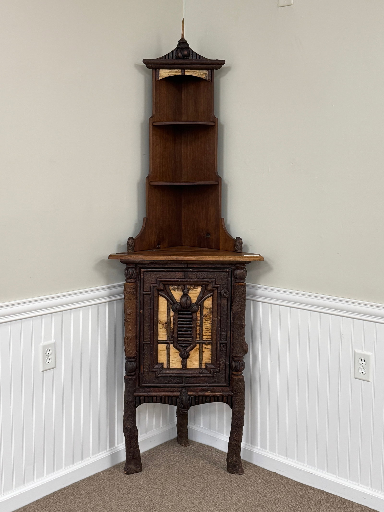 Jonathan Swartwort Adirondack Corner Cabinet: custom made in 2012 with walnut top and mosaic twig and birch decorated base. Measures 27" wide x 81" tall to top of horn finial. (Fisher of the Berry Studio) Investment quality furniture by an Award 