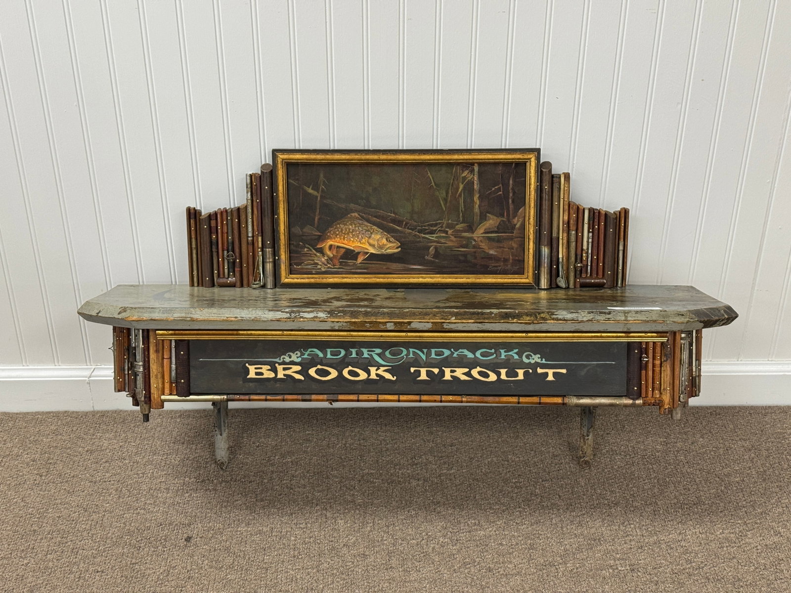 Barney Bellinger Adirondack Brook Trout Wall Shelf: Sampson Bog Studios. Decorated with vintage bamboo fishing rods. 35" wide x 11" deep x 19" tall.
