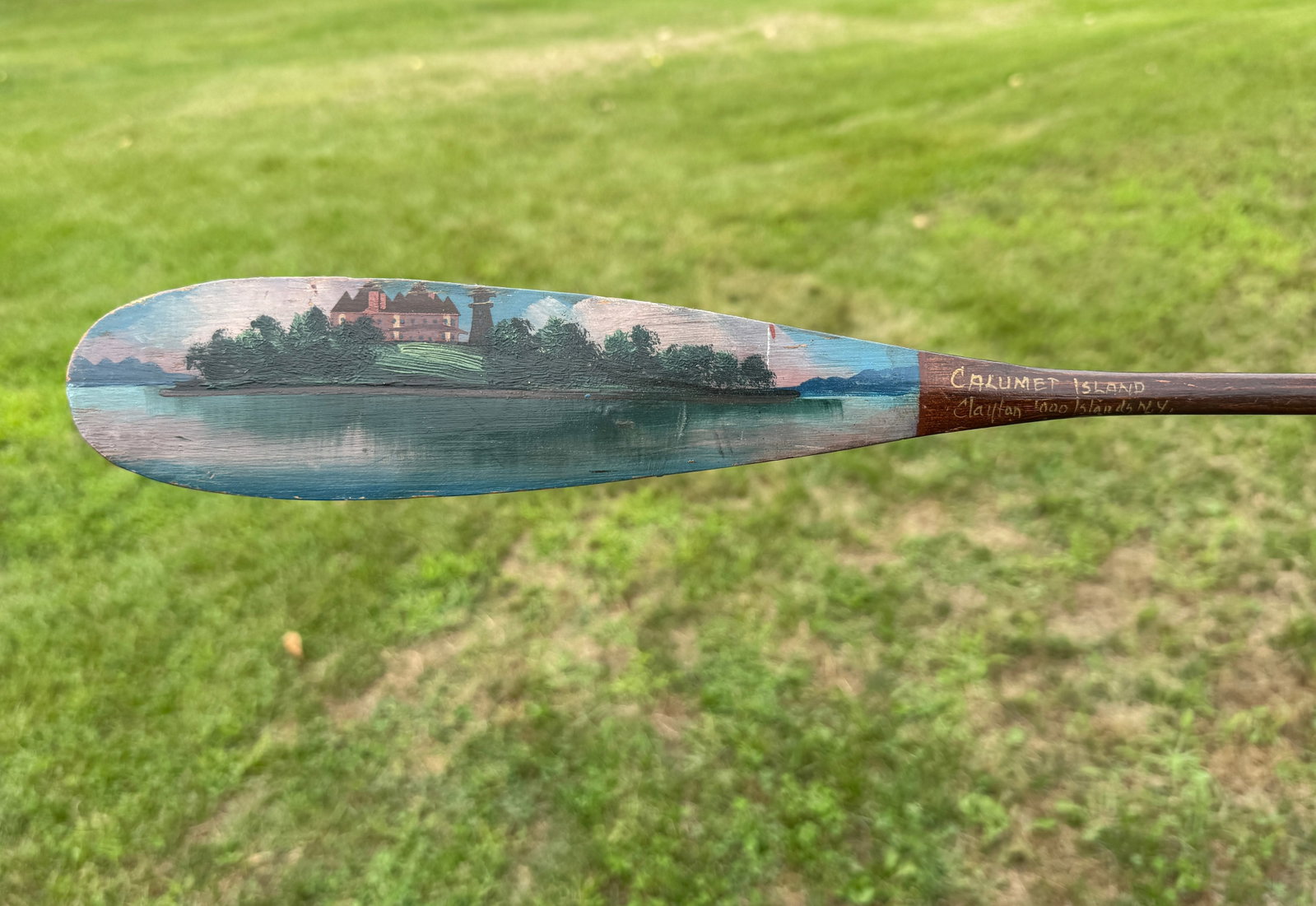 Keech "Calumet Island" Souvenir Paddle: 22" long. In very good condition .Alpheus Keech (1855-1926) From the Collection of Dr. Dean Hyde.