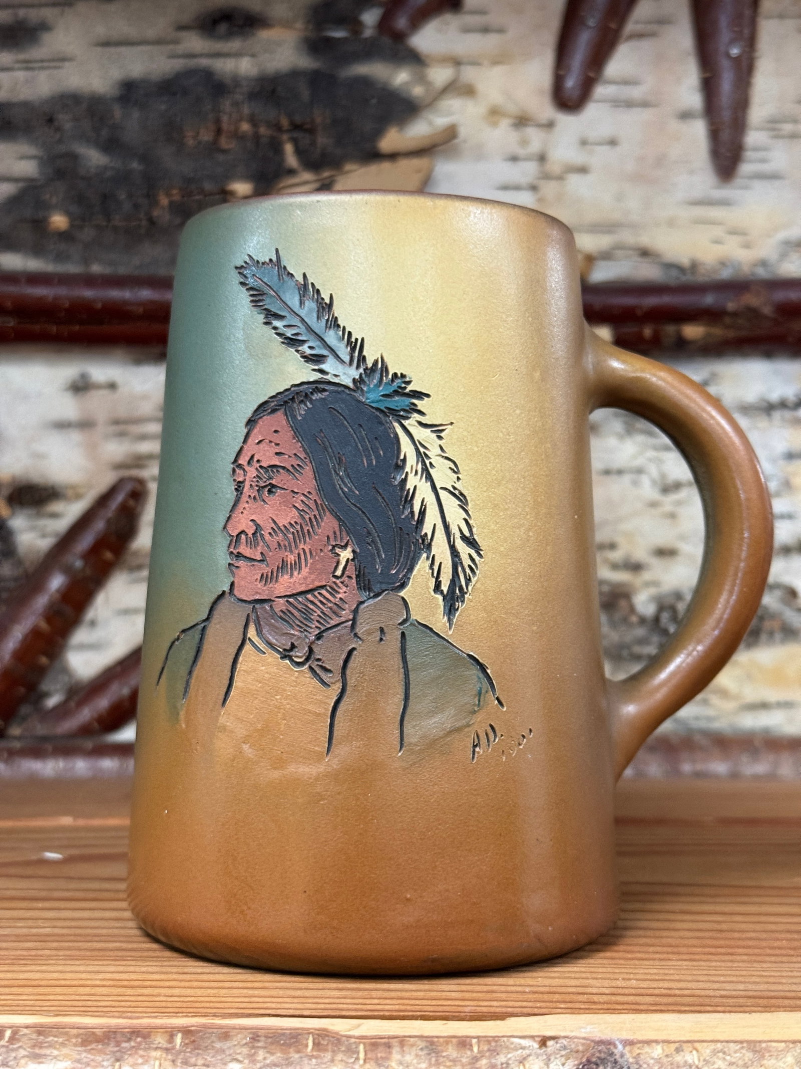 Weller Dickensware Mug with Indian: 5.5" tall and in good condition.