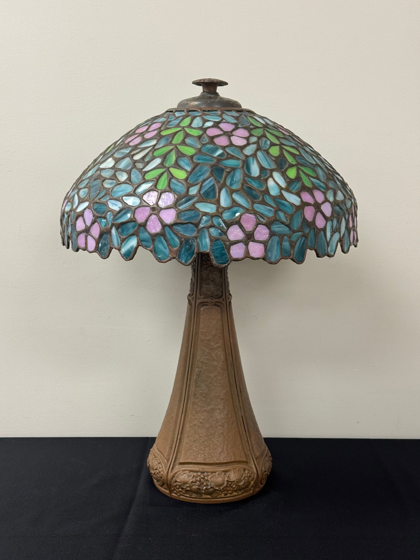 Bradley & Hubbard Leaded Glass Table Lamp: 16" diameter shade, base signed Bradley & Hubbard. 23" tall. one piece of glass along the bottom edge is damaged.
