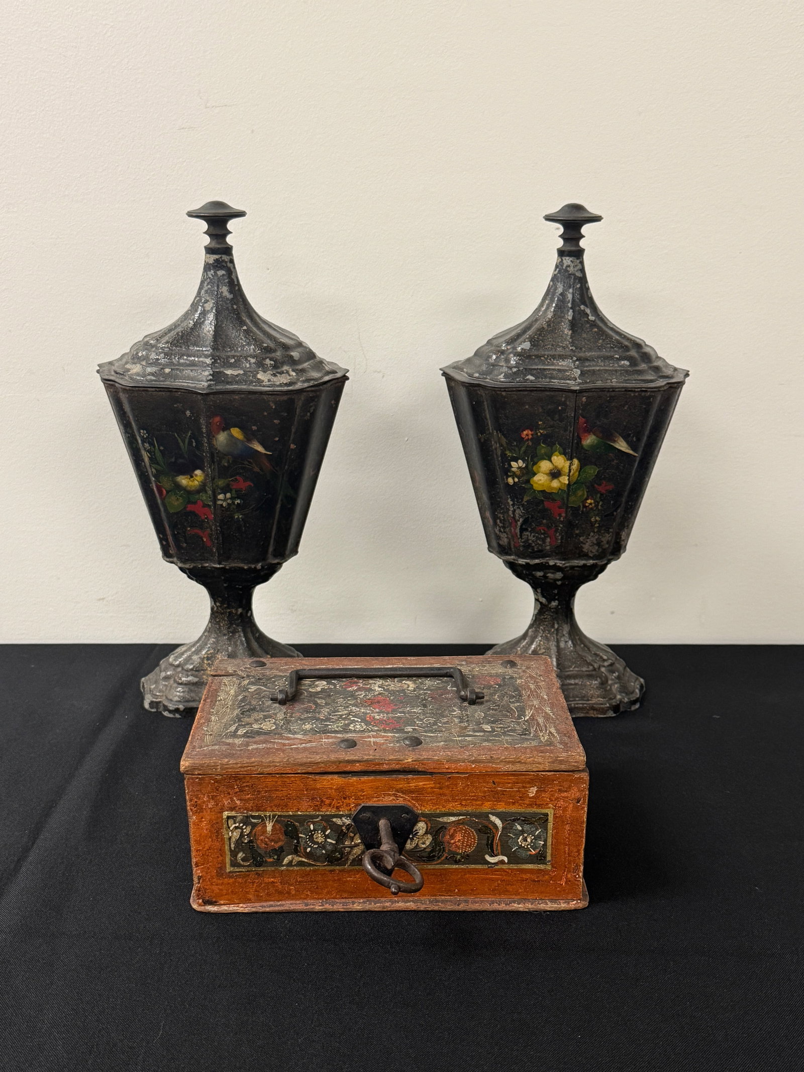 2 Toleware Urns & Early Decorated Document Box: From the Whitney / Vanderbilt Collection at Camp Deerlands, Whitney Park. Early hand painted decorated box with key measures 7.5" wide. Hand painted toleware urns with bird are 12.5" tall.