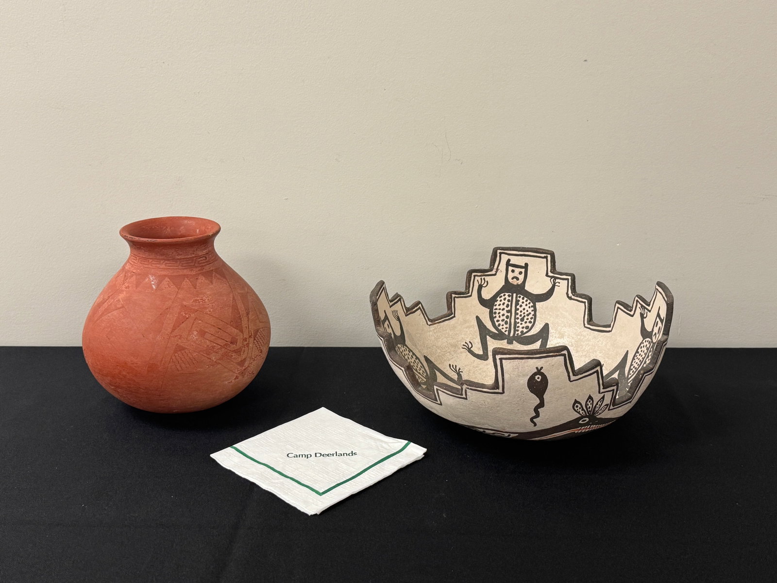 Zuni Pottery Bowl & Redware Vase: Zuni pottery bowl with frog and tadpole motif with a Kiva step rim measuring 10" in diameter. Bowl has a chip in the rim. From Camp Deerlands, Whitney Park. Redware vase measures 6.5" tall.