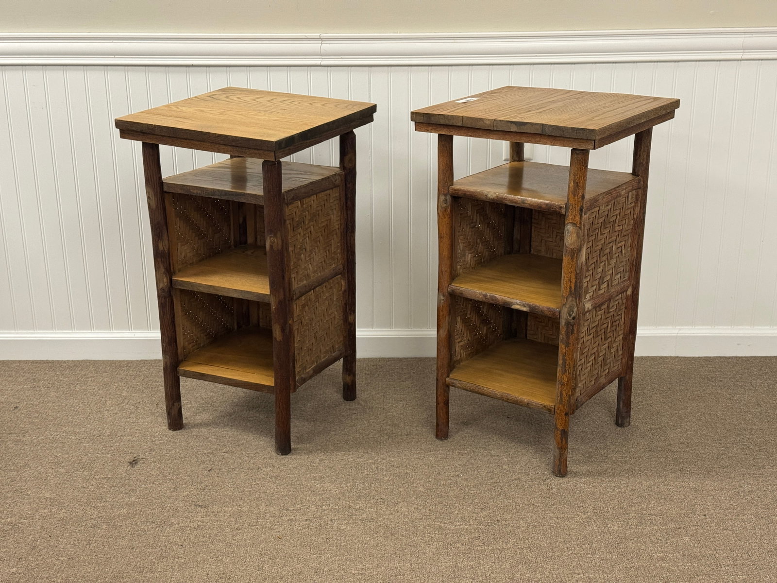 Pair of Old Hickory Stands with Woven Sides: branded Old Hickory, weaving in good condition, clean and in very good condition. From Camp Togus, Whitney Park. 16" x 16" x 30". Magazine Stands No. 239. Circa 1930