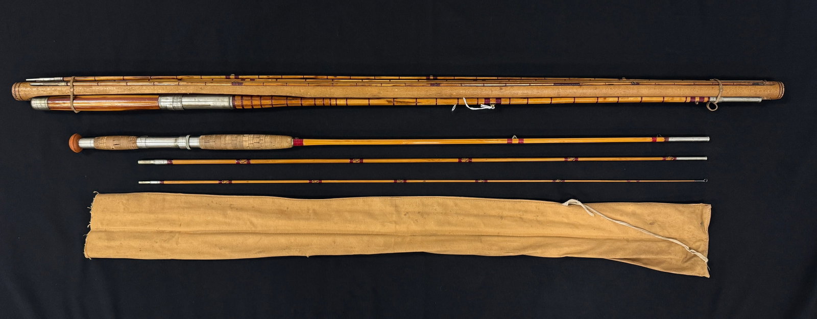 2 Vintage Bamboo Fishing Rods: one marked Leonard 10' 3 piece with a canvas bag and the other one unmarked with a form fitted case. From Camp Deerlands, Whitney Park.