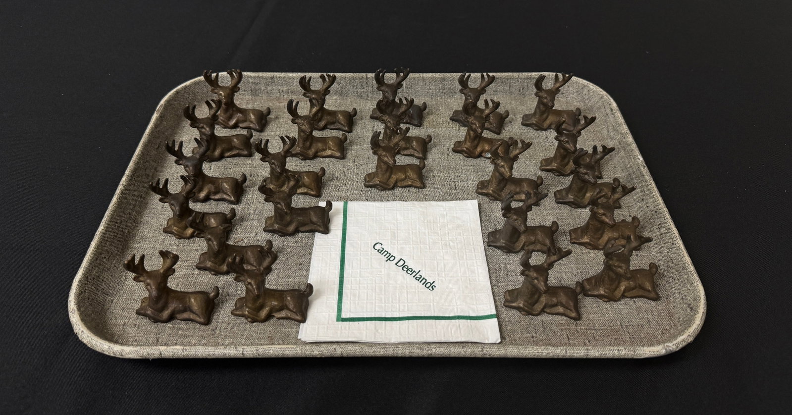 24 Deer Napkin Weights: one deer is missing one antler. From Camp Deerlands, Whitney Park.