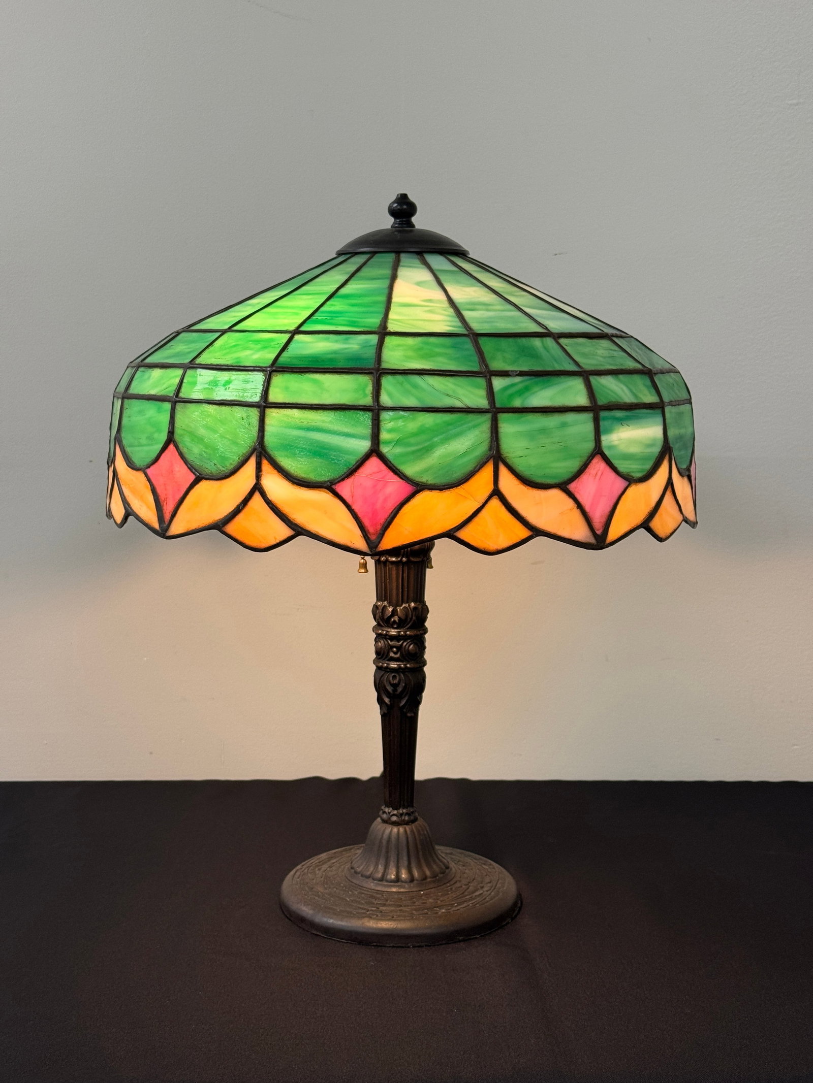 Early 20th Century Leaded Glass Table Lamp: 16.5" diameter shade. 21" tall. In working order. Has some cracked panes of glass.