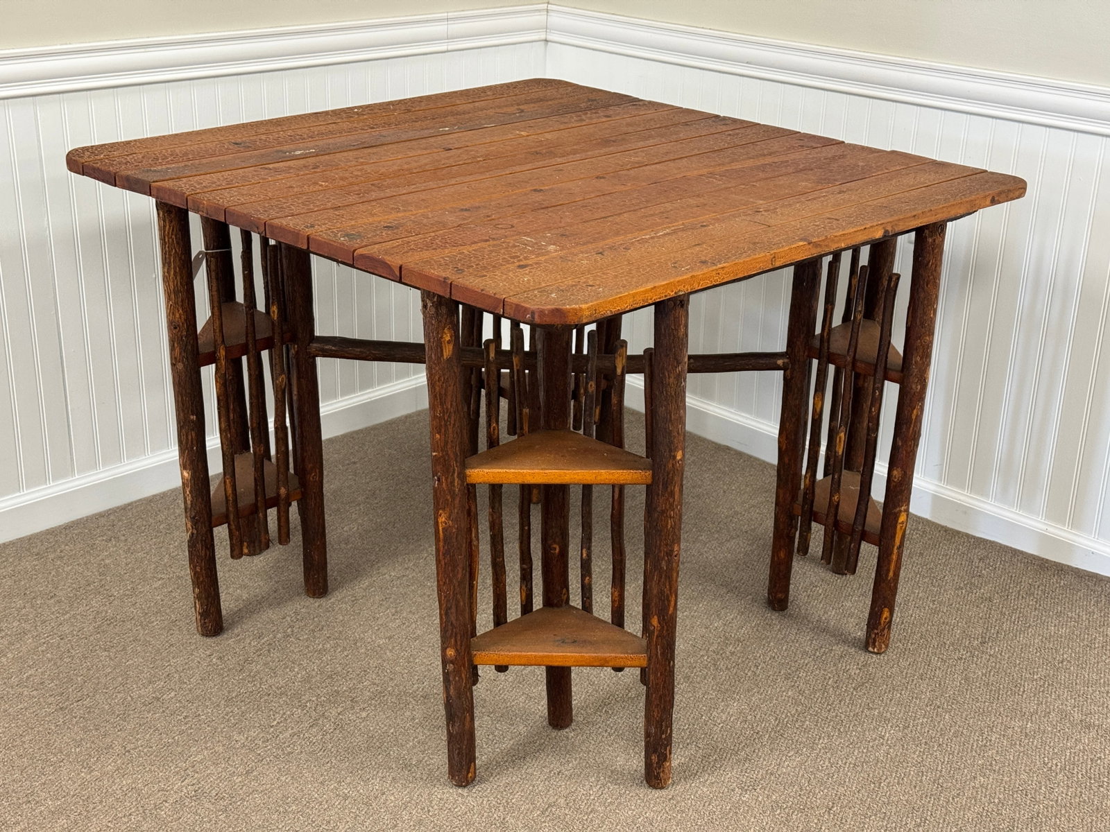 Adirondack Rustic Red Cedar Table: Early 1900s. Unique form with original slat top. 42" square x 30" tall. Crackled original varnish. From look out cabin at Camp Togus in Whitney Park.