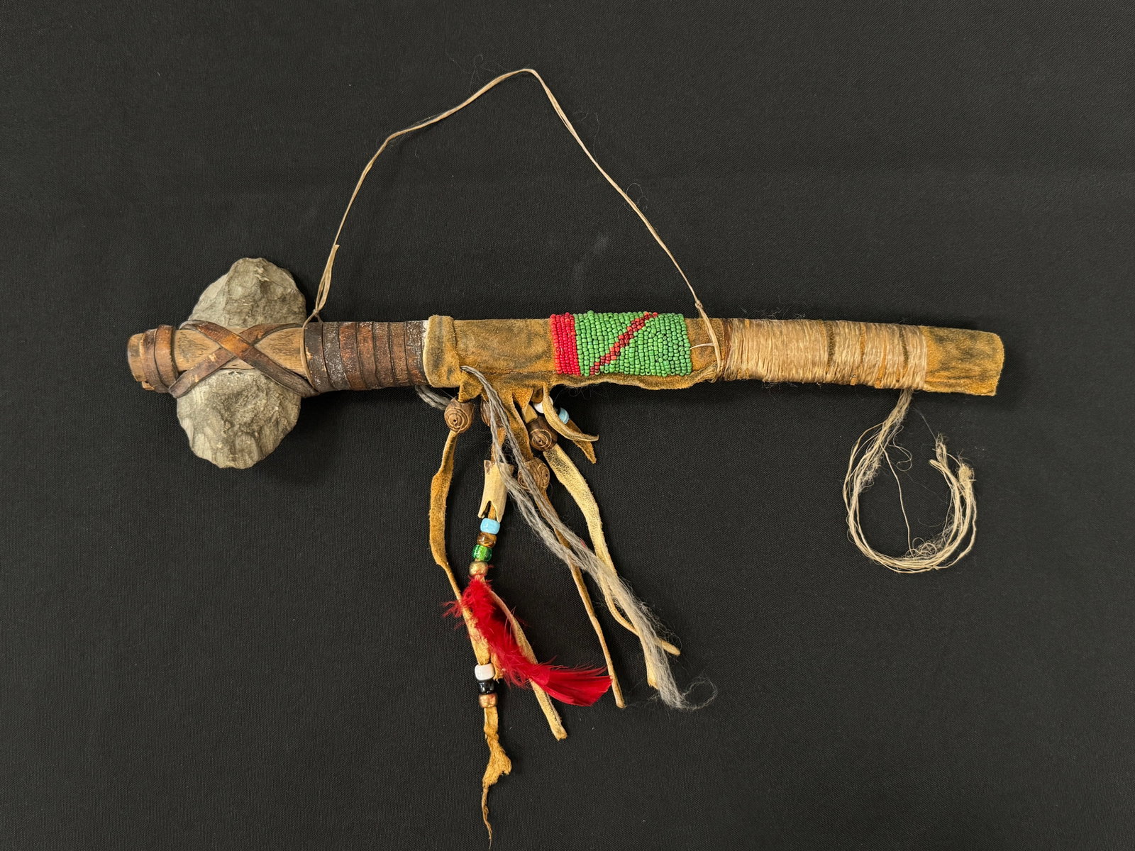 Native American Tomahawk w/ Stone Head: and glass beaded handle. 15.5" long.