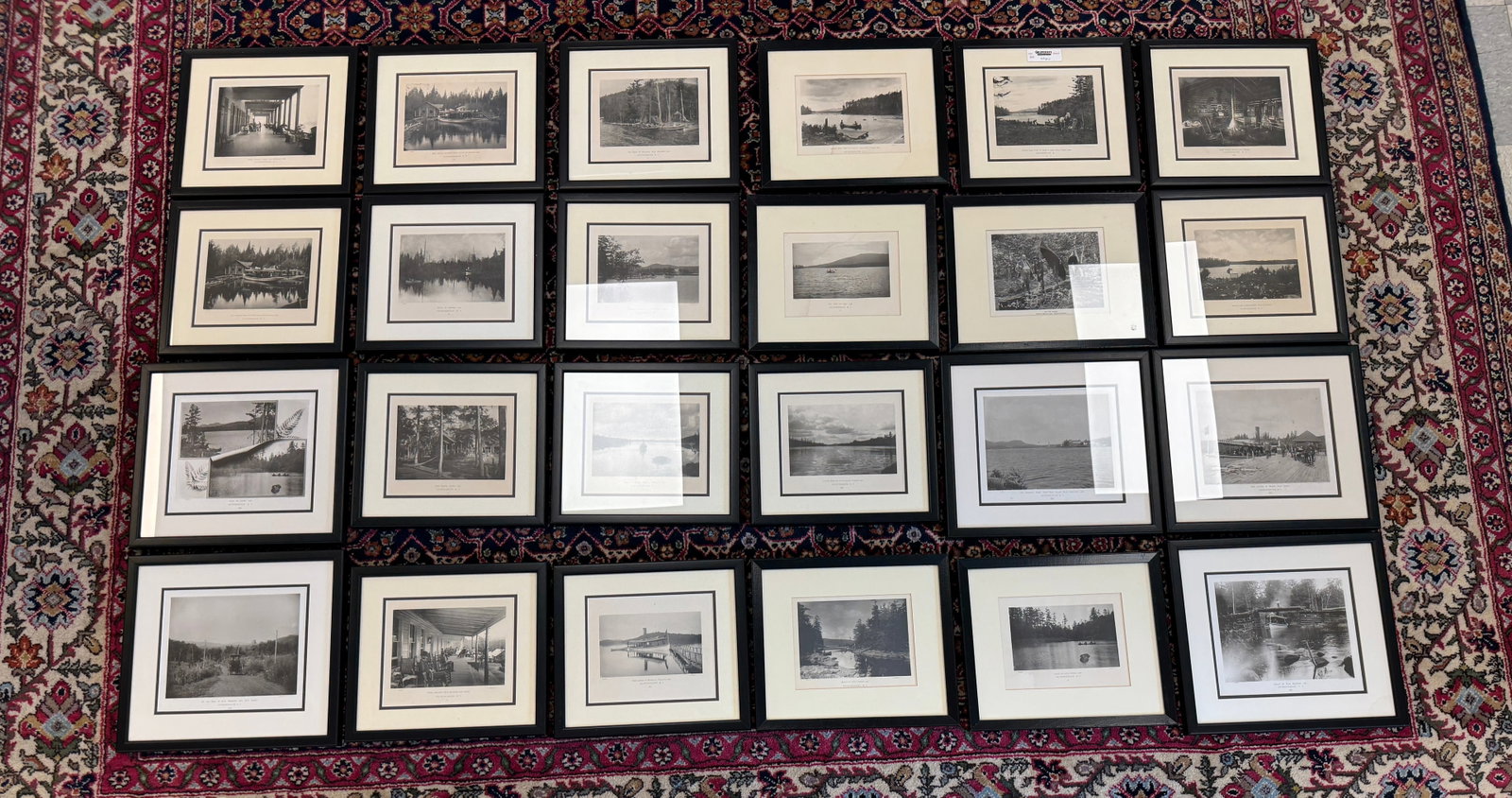 Collection of 24 Black & White Adirondack Prints: each framed and double matted. Scenes from the early 1900s by E. Bierstadt. Each are approximately 12" x 14". Scenes include: Guideboats, launches, great camps, hotels, camping and more.
