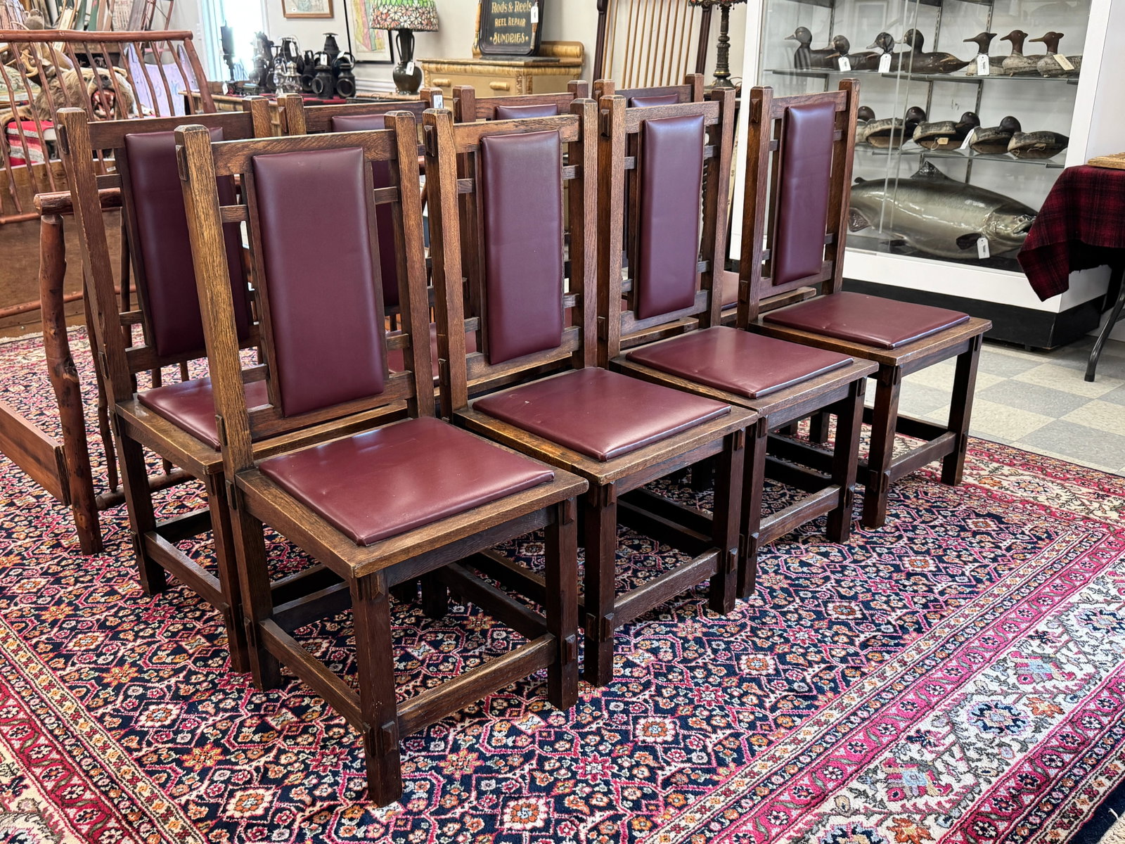 Set of 8 Mission Oak Dining Room Chairs: original varnish, upholstered seats and back, unsigned. All in good condition.