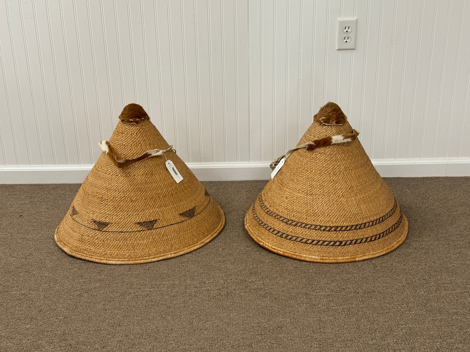 2 Native American Burden Conical Baskets: 24" diameter and 20" tall. Geometric designs with leather straps. From Camp Deerlands, Whitney Park.