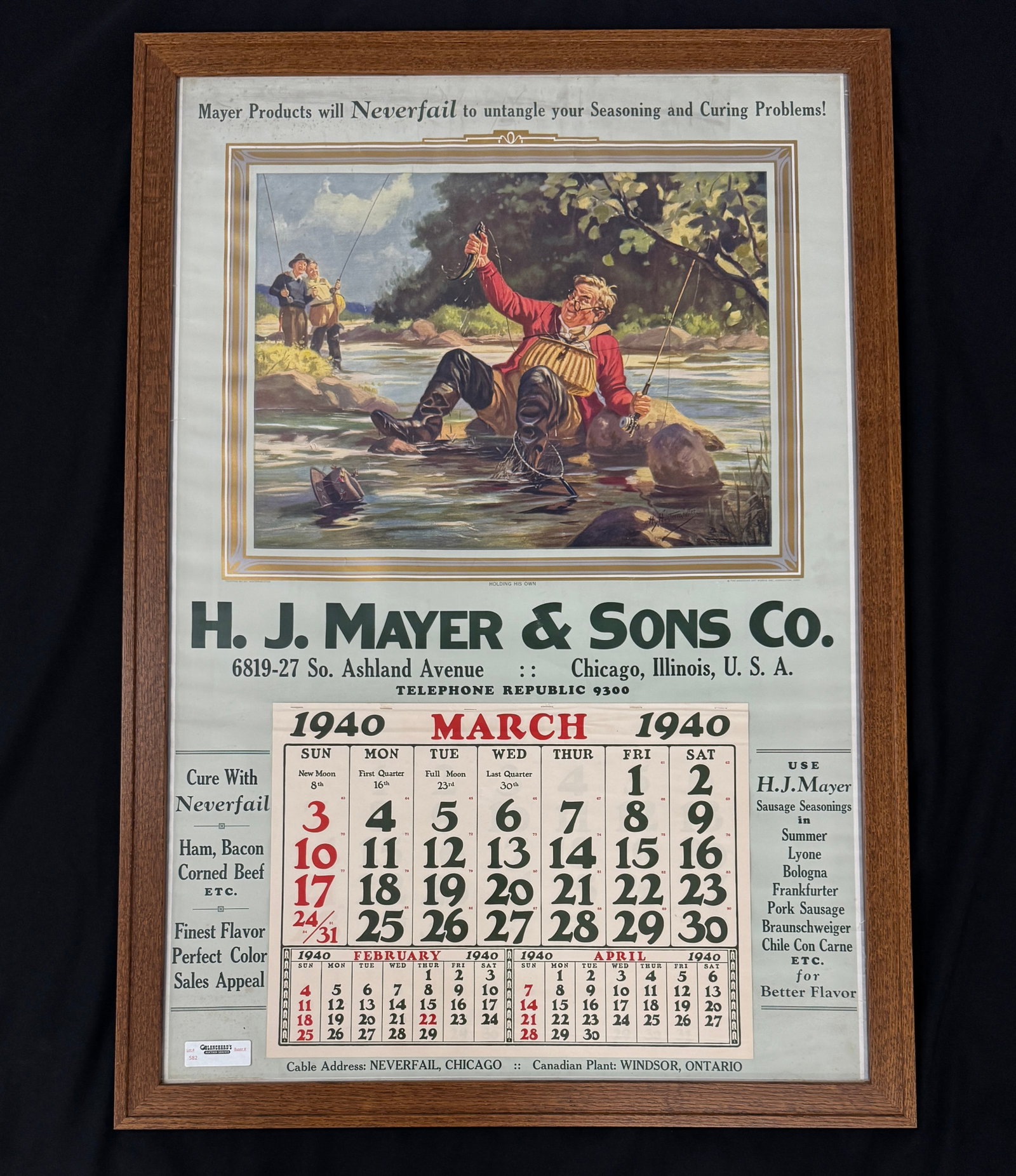 1940 Framed Fishing Calendar: Holding His Own" Painting by Hintermeister. In a quarter sawn oak mission frame. 32" x 46