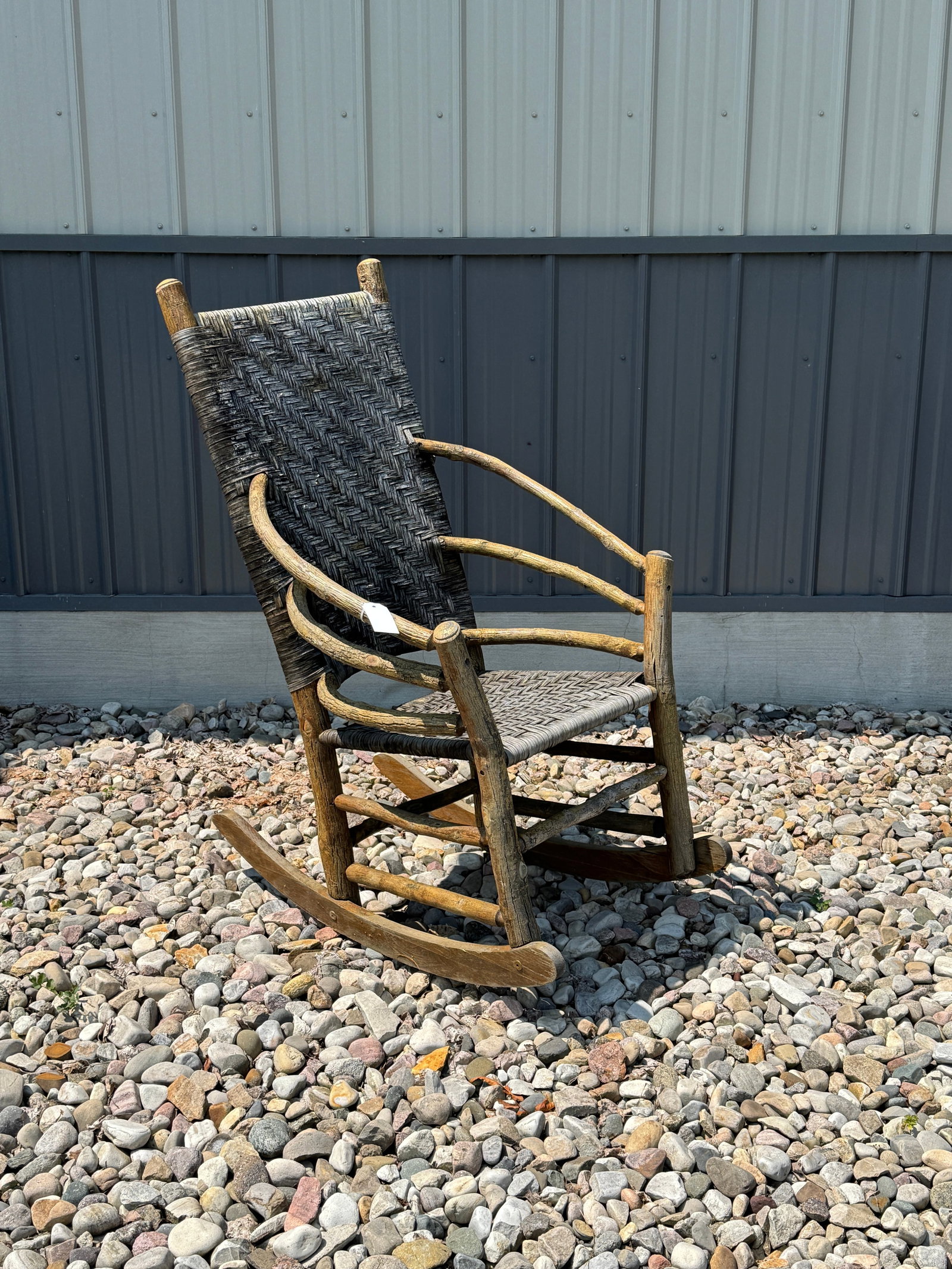 Old Hickory Tall Back Porch Rocker: with brass tag. 4' tall x 25" wide. Weathered finish. From Camp Deerlands, Whitney Park.